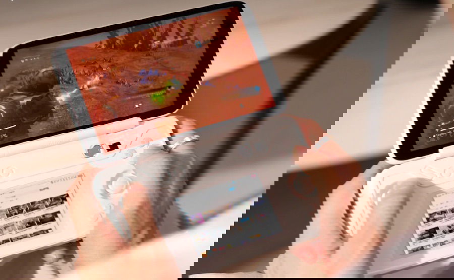 The Ayaneo Flip DS in a person's hand