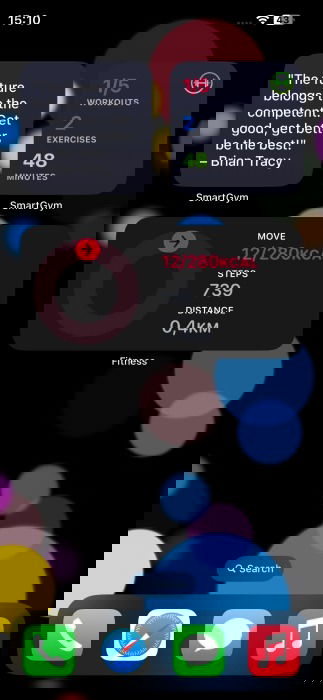 Widgets from SmartGym and Fitness apps view on iPhone homescreen.