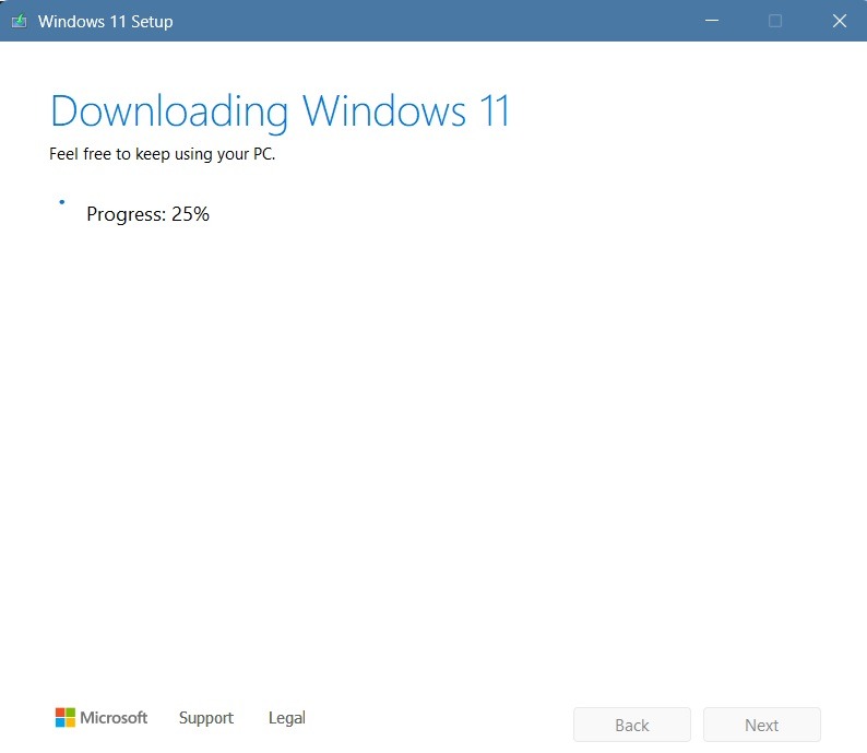 Windows 11 downloading on device using a Media Creation Tool for USB.