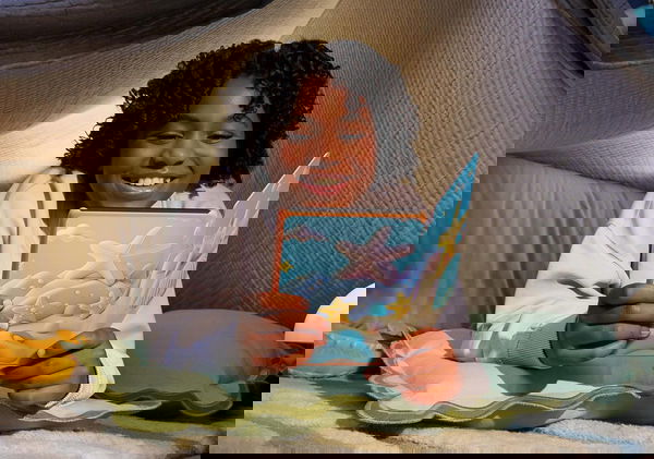 Child Reading On Paperwhite Kindle