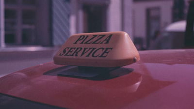 Pizza delivery car.