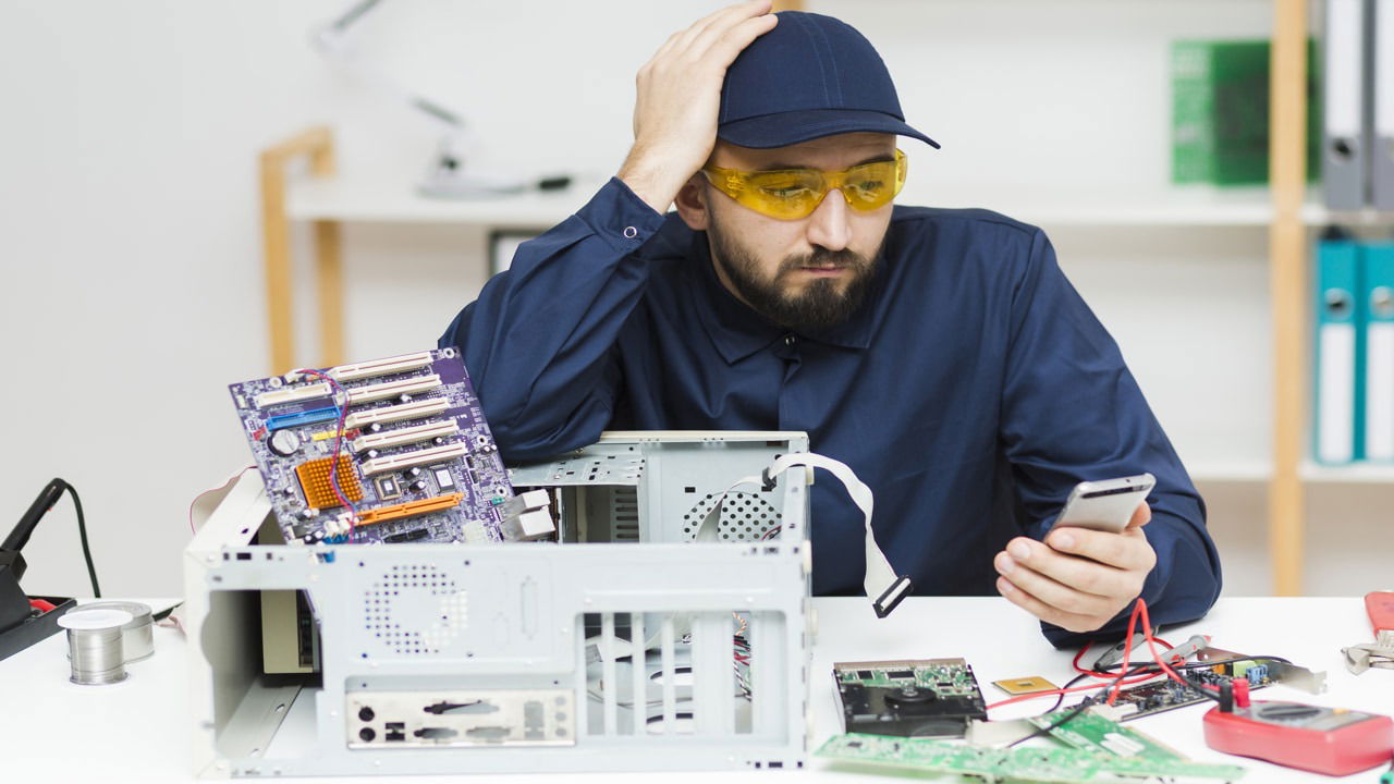 man having trouble fixing PC