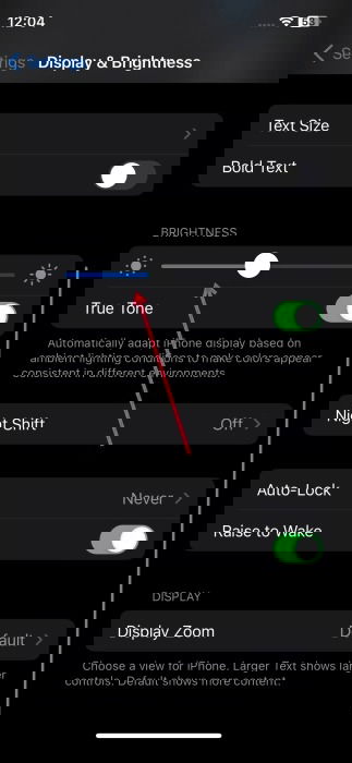 Adjusting brightness on iPhone. 