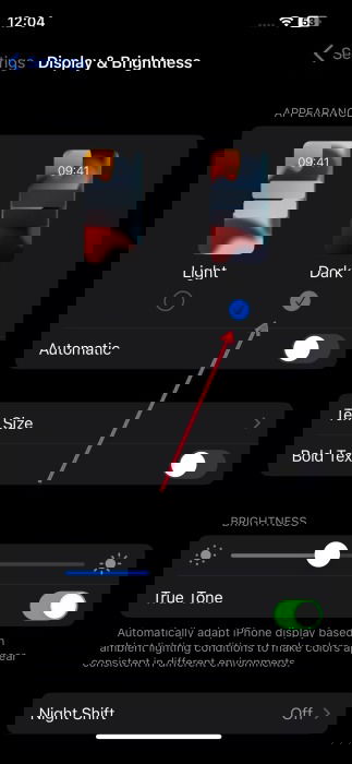 Switching to dark mode in iPhone Settings.