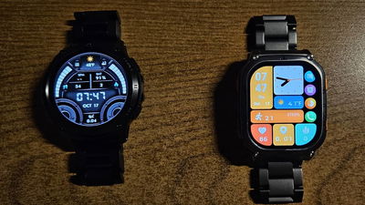 Two Kospet smartwatches side by side.