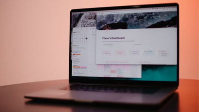 A laptop displaying Notion interface.