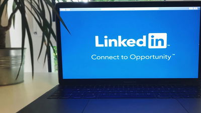 Black laptop with linkedIn logo in the middle