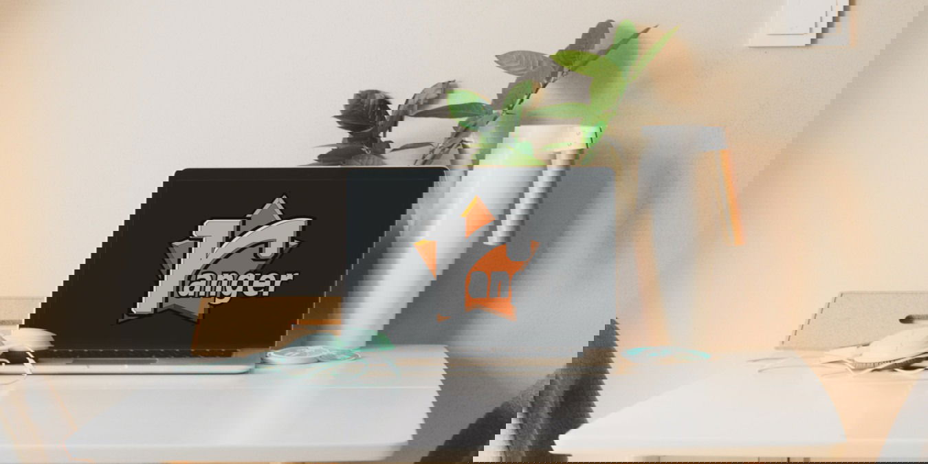 A photograph of a laptop on a dining table.