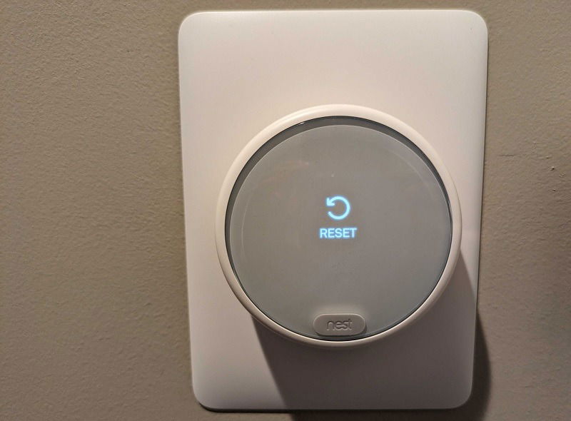 Reset button on a Nest Thermostat