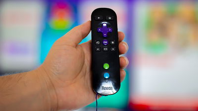 Someone Turning On Roku TV After Fixing Issues