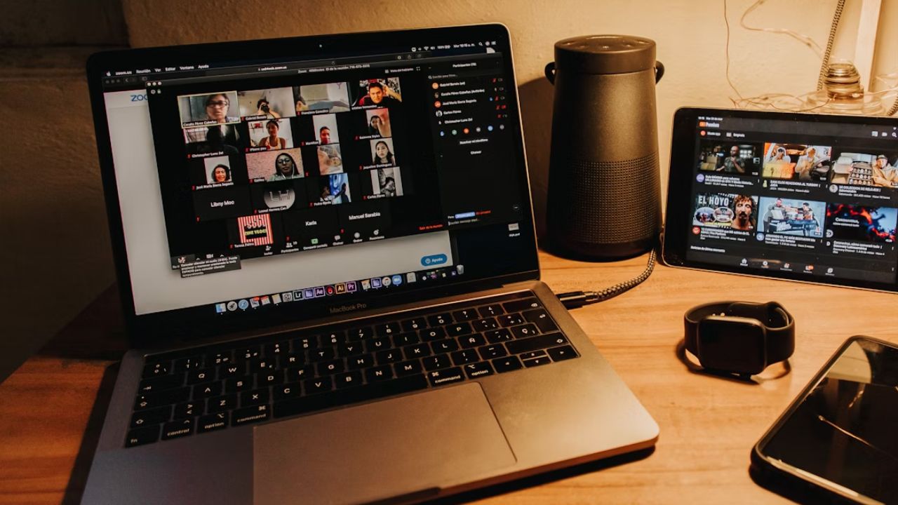 A Zoom meeting displaying the chat section on a laptop.
