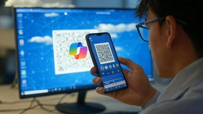 A man scanning QR code on PC with his phone.