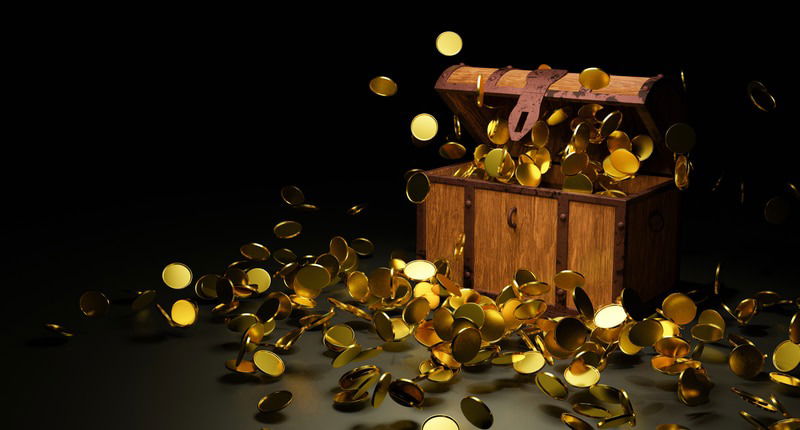 treasure chest with gold coins bursting out