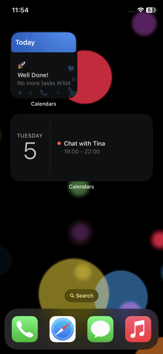 Calendars widgets visible on iPhone home screen.
