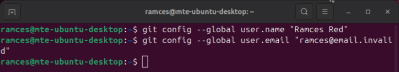 A terminal showing the commands to set the username and email in Git.