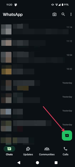 Pressing the new chat button in WhatsApp on Android. 